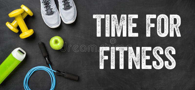 time-fitness-equipment-dark-background-84164532